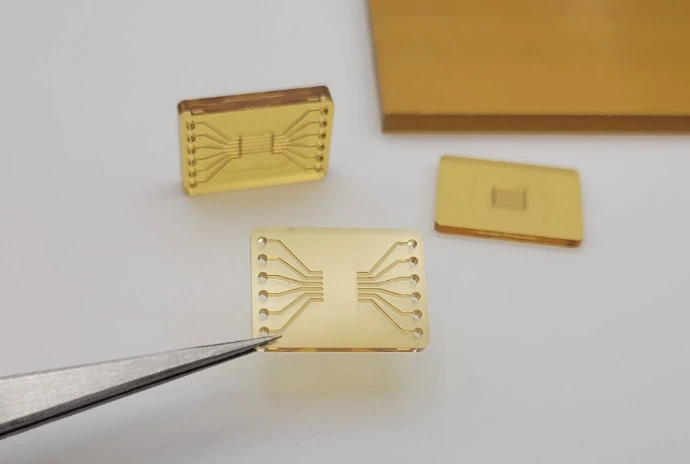 Precision-machined polymer microfluidic components